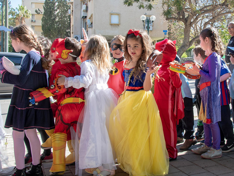 Kindergarten children parading in their Purim costumes in Tel Aviv.